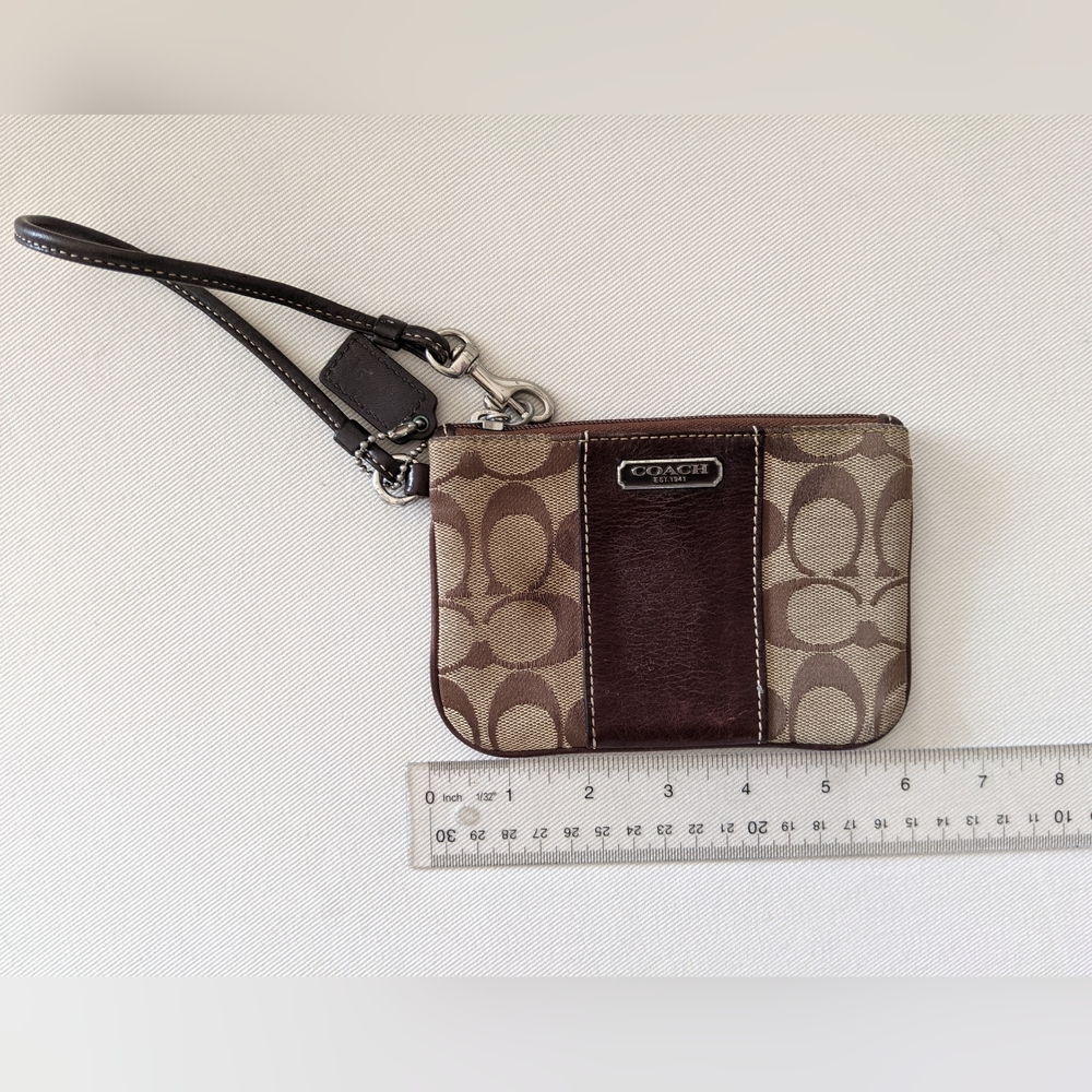 Brown authentic Coach wristlet 6"